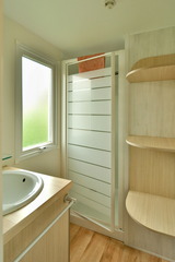 Ferienhaus in Pelzerhaken - Mobilheim  Pacifique - Dusche mit Waschplatz