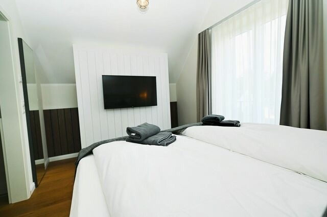 Ferienhaus in Hohwacht - M&ouml;wenweg Die Strandburg im M&ouml;wenweg App. 3 - Bild 13