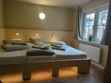 Ferienwohnung in Grube - Erdgeschoss, &uuml;berdachte Terrasse, Familienbett, Holzfu&szlig;boden - Bild 9