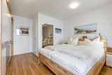 Ferienwohnung in Fehmarn OT Burgtiefe - Strandburg Meereszauber mit TraumOstseeblick - Bild 4